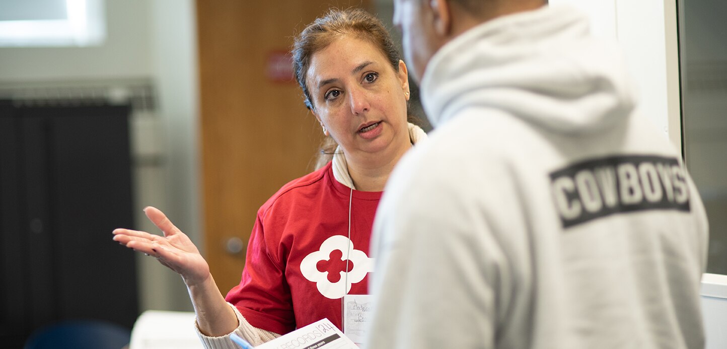 KeyBank volunteer helping woman with tax preparation