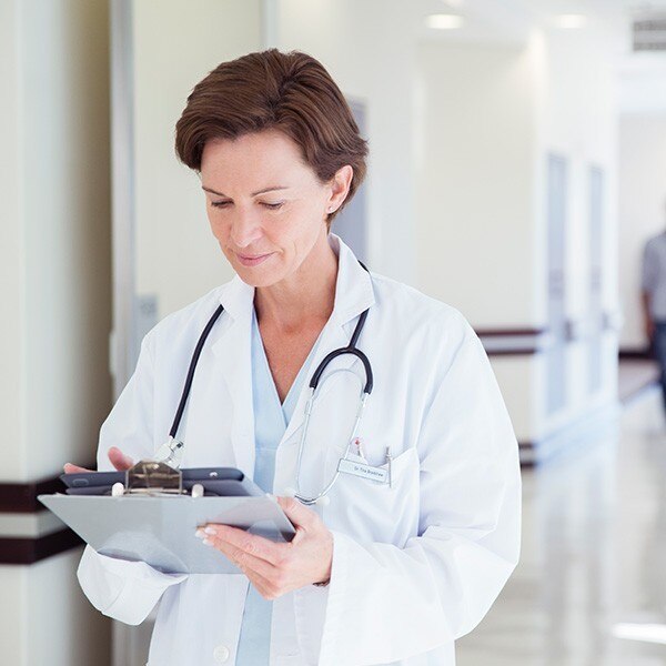 Doctor reviewing chart