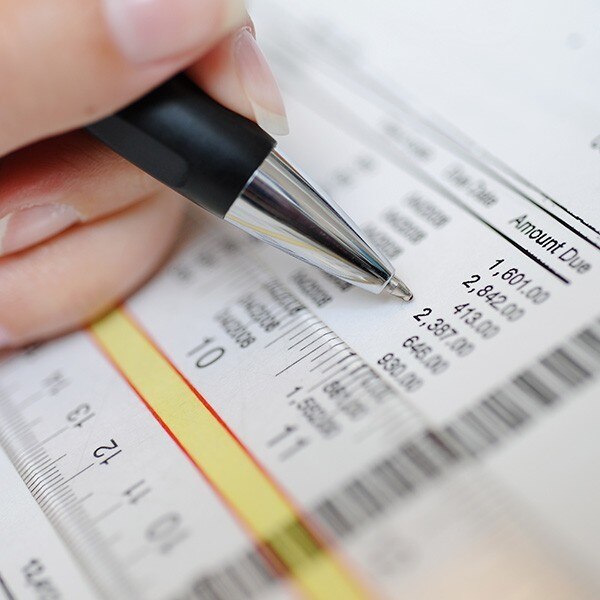 Person reviewing payments due