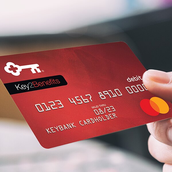 Girl with Key2Benefits card