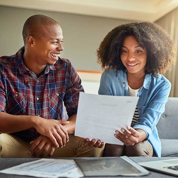 Man and woman going over papers together