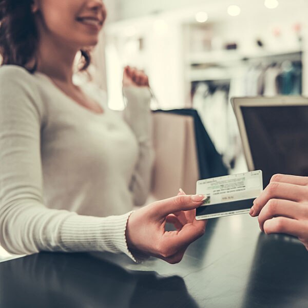 Woman pays with credit card