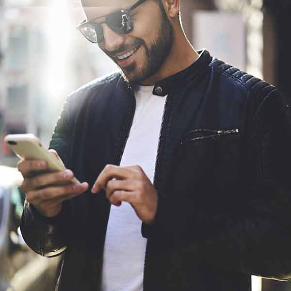 A young man with a smartphone