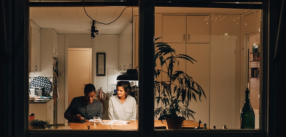 Couple studying banking 101 documents
