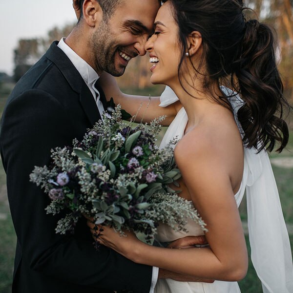 Bride and groom hugging