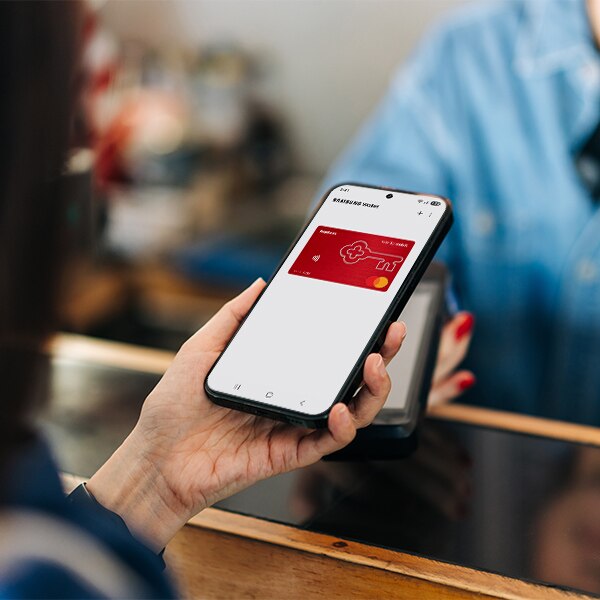 hand holding cell phone