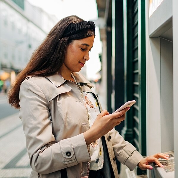 woman using atm