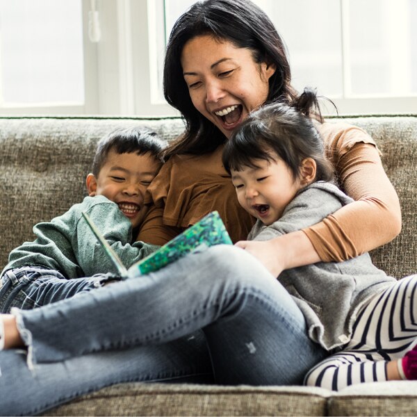 laughing on the couch