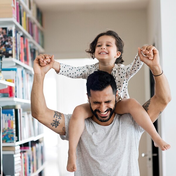 on daddy's shoulders