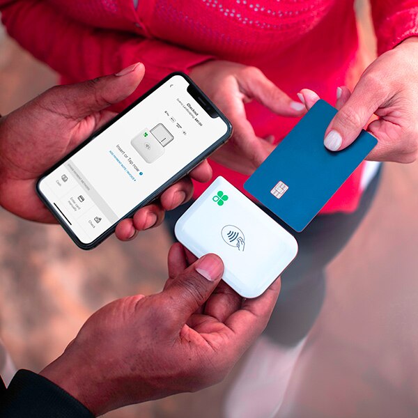 woman paying with credit card using Clover Go