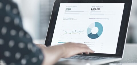 Woman typing on computer