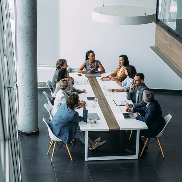 business meeting around white table